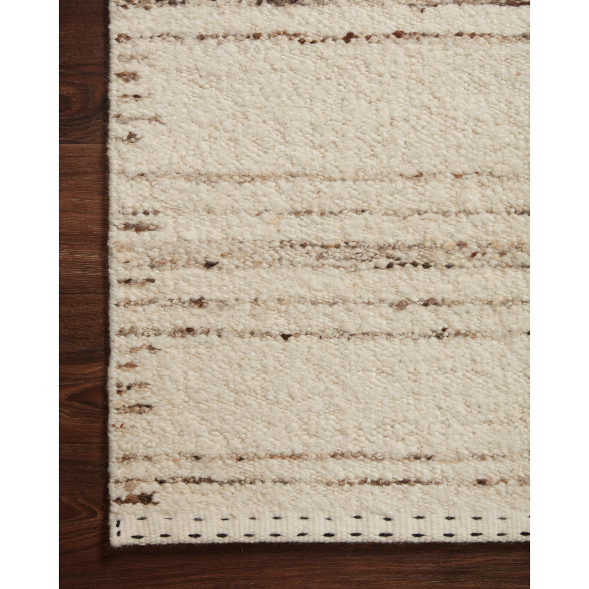 Rugs by Roo Loloi Roman Ivory Pebble Area Rug in size 5' 6" x 8' 6"