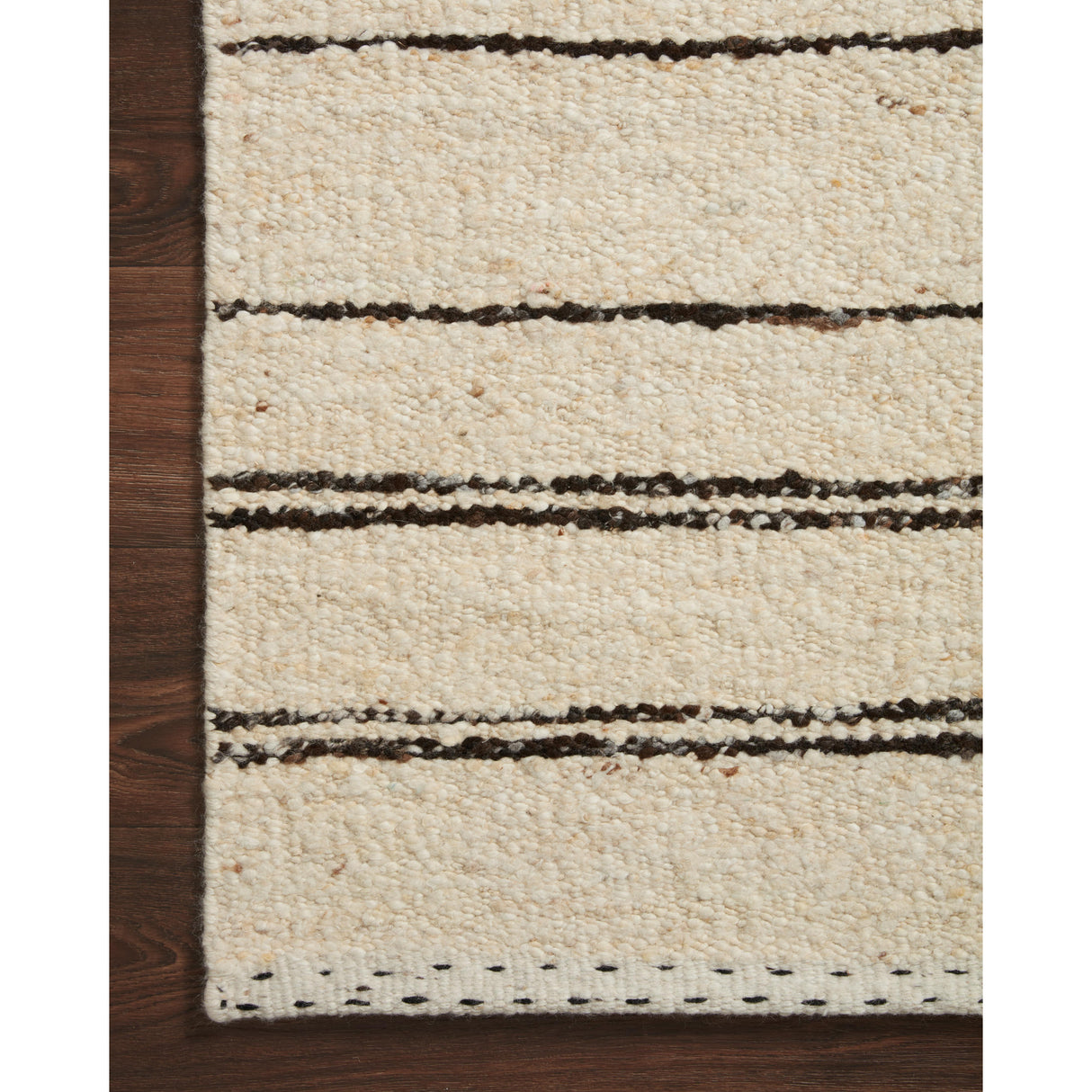 Rugs by Roo Loloi Roman Natural Charcoal Area Rug in size 5' 6" x 8' 6"