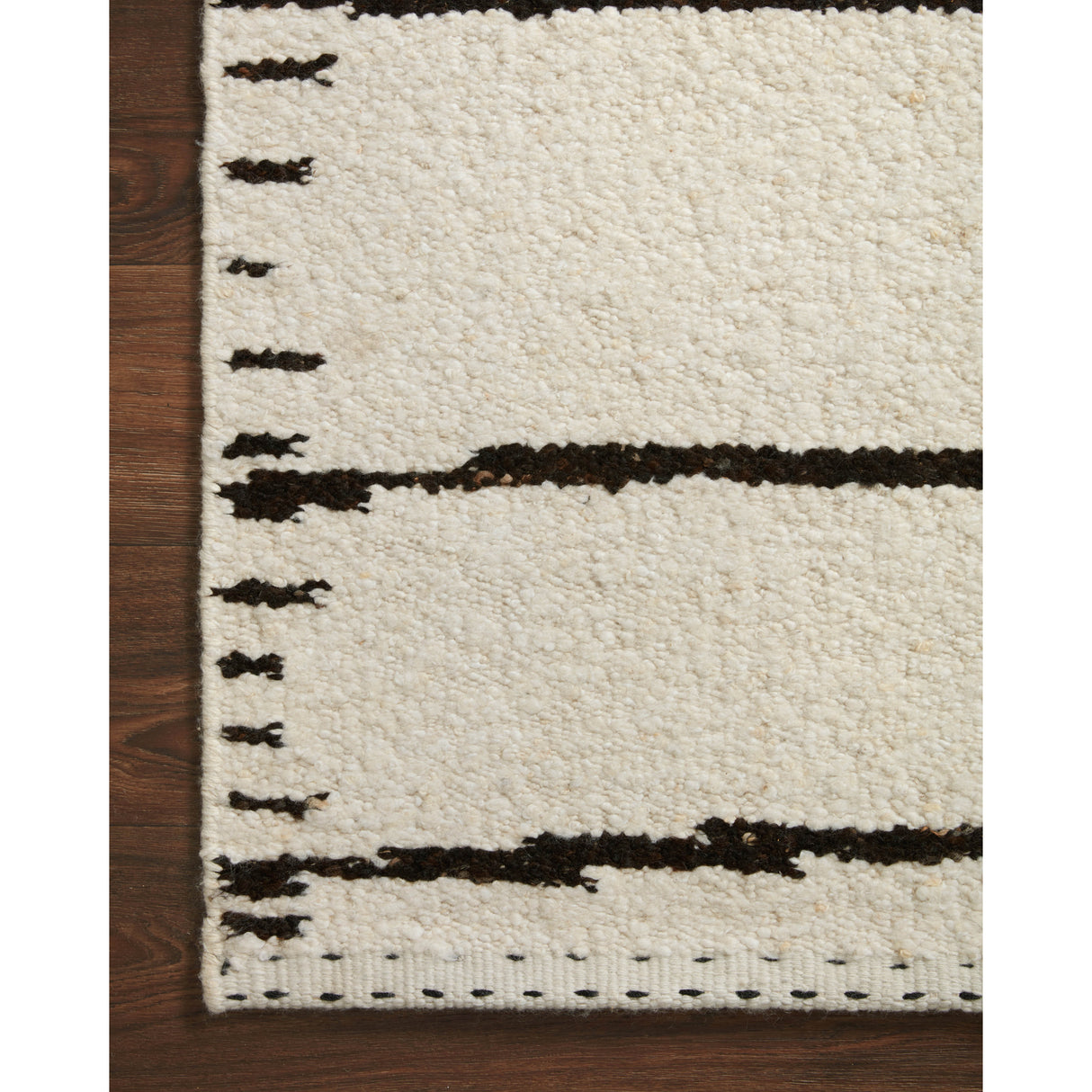 Rugs by Roo Loloi Roman Ivory Black Area Rug in size 5' 6" x 8' 6"